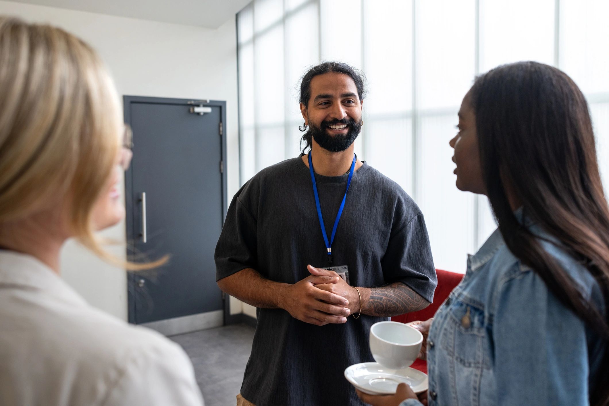 Community members connecting before an event