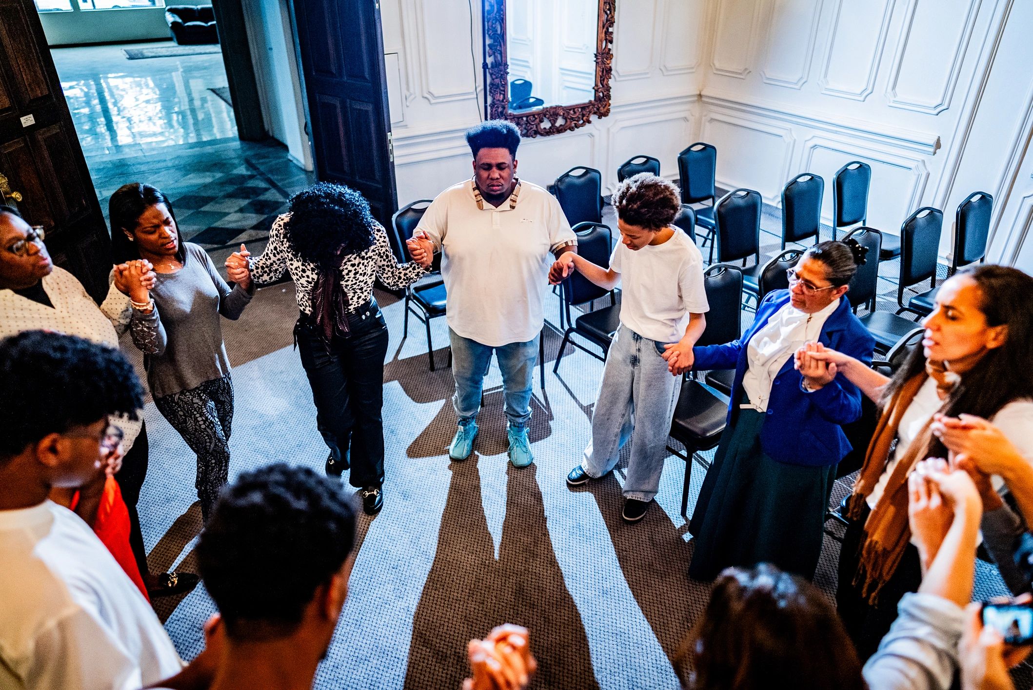 People praying together in church community